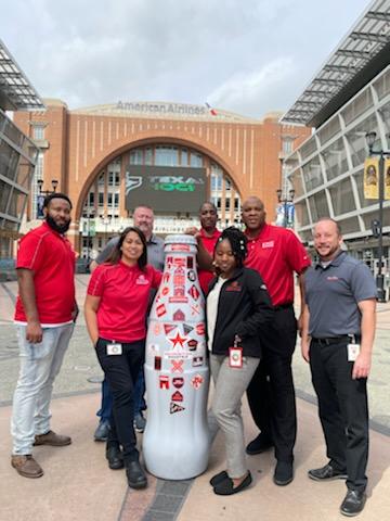 Mesquite heroes and the Recognition Roadtrip Bottle visit the American Airlines Center on Feb. 21, 2022. Opened in 2001, the American Airlines Center has become a top national arena and the heart of Dallas entertainment. It is the home of beloved Dallas teams like the Mavericks and the Stars, as well as the host to talented performers like Justin Timberlake, Billy Joel and Garth Brooks.