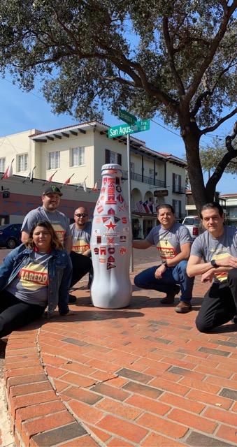 Laredo heroes visit La Posada Hotel with the Recognition Roadtrip Bottle on March 3, 2022. The historical hotel has long been the cultural and social center of Laredo, where it has remained on the banks of the Rio Grande since the 19th century. La Posada Hotel was built around several historical buildings, including the former Capitol of the Republic of the Rio Grande, a jail and the old Laredo High School! 
