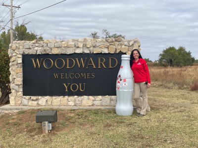 Kelly Clark, Route Sales Manager, takes the Recognition Roadtrip Bottle to the edge of Woodward. This West Oklahoma town was founded in 1887 and provided cattle for eastern markets.