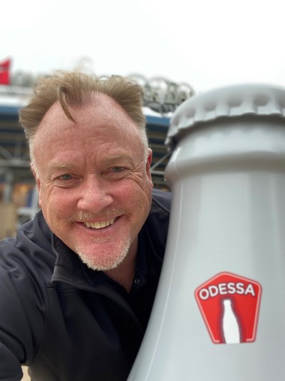 Sean Diss, Sales Manager, takes the Recognition Roadtrip Bottle around the town of Odessa on Nov. 4, 2021.
