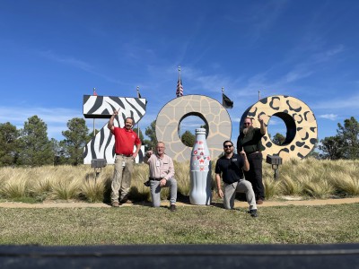 Abilene heroes with the Recognition Roadtrip Bottle at the Abilene Zoological Park on Nov. 8, 2021. The Abilene Zoo was founded in 1966 and has more than 1,000 animals and over 250 different species.