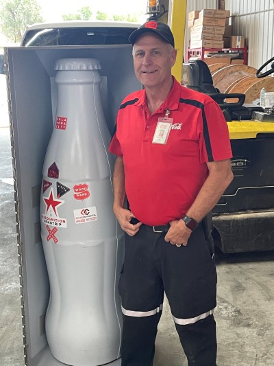 Tom Clark, Service Tech, returns the Recognition Roadtrip Bottle back to its transportation case as it gets ready for the next stop in the Recognition Roadtrip on Oct. 28, 2021.