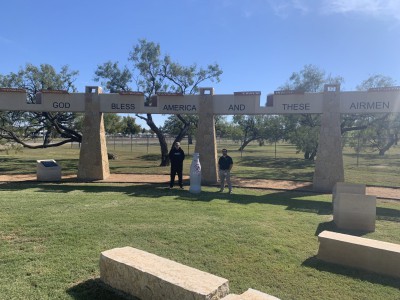 John Gardener, Warehouse Manager I, and Garret Dussia, Maintenance Manager III, at Dyess Memorial Park on Nov. 8, 2021. Dyess Memorial Park was built in 2019 and honors 79 airmen and personnel for their service.