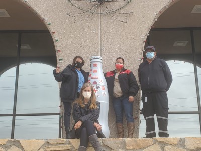 El Paso heroes say “goodbye” to the Recognition Roadtrip Bottle at the El Paso Distribution Center as the bottle gets ready for its next stop on Nov. 27, 2021.