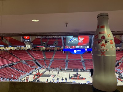The Recognition Roadtrip Bottle at United Supermarkets Arena on Dec. 9, 2021. With a capacity of 15,000, the multipurpose Arena hosts the Red Raiders men’s basketball, women’s basketball and volleyball teams. (Texas Tech earned their first trip to the NCAA tournament championship game with a Final Four win over Michigan State.)