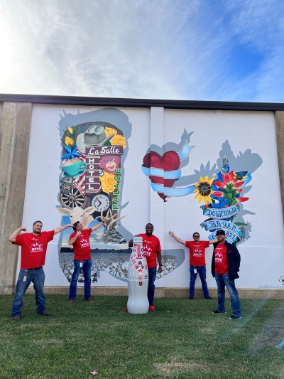 CCSWB heroes welcome the Recognition Roadtrip Bottle to Bryan, Texas on Jan. 12, 2022. The mural, located in downtown Bryan, was created by a group of local artists to represent the city’s defining characteristics