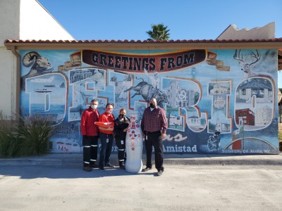 CCSWB heroes welcome the Recognition Roadtrip Bottle to Del Rio on Jan. 3, 2022. The mural in the background of the picture shows the Hispanic influence that enriches Del Rio. It is one of many throughout the city that is located on the Mexico-U.S. border