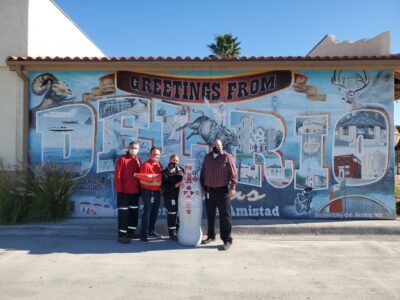 CCSWB heroes welcome the Recognition Roadtrip Bottle to Del Rio on Jan. 3, 2022. The mural in the background of the picture shows the Hispanic influence that enriches Del Rio. It is one of many throughout the city that is located on the Mexico-U.S. border