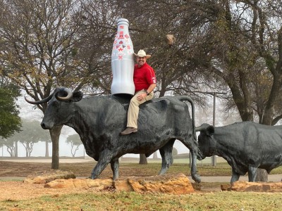 Donnie Ratliff, Sales Execution Manager, playfully poses with the Recognition Roadtrip Bottle on Dec. 21, 2021.