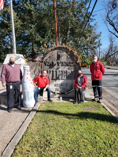 Del Rio heroes with the Recognition Roadtrip Bottle at the Val Verde Winery. The Val Verde Winery was established in 1883 and is the oldest continuously operating winery in Texas.