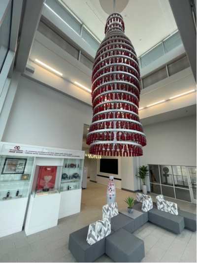 Bottles, bottles and more bottles! On Jan. 11, 2022, the Recognition Roadtrip Bottle takes a break in the Northpoint lobby ‘hanging out’ alongside the iconic Coca-Cola bottle chandelier. Uniquely made by Ion Art just for Northpoint, the chandelier is housed at the Northpoint facility and hangs proudly where all associates can see!