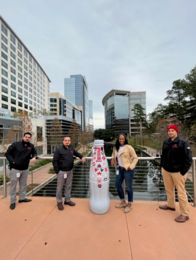 Northpoint heroes with the Recognition Roadtrip Bottle at the Woodlands Waterway on Jan. 11, 2022. The Waterway is often called the “lifeblood of the city,” as it stretches from The Township to Lake Woodlands, connecting all the attractions along the way.