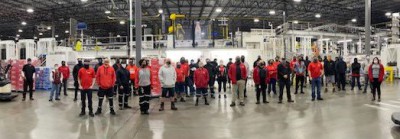 Northpoint heroes with the Recognition Roadtrip Bottle and the vertique sorter, which helps pack the iconic Coca-Cola brands for distribution, on Jan. 11, 2022. No visit to Houston is complete without seeing the Northpoint facility, the first bottling facility built in the U.S. in nearly a decade! Northpoint opened in 2020, and it is 100% powered by renewable energy!