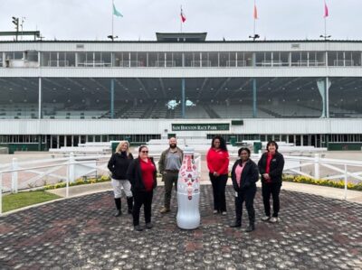 Northpoint heroes with the Recognition Roadtrip Bottle at the Sam Houston Park Raceway on Jan. 11, 2022. Today, the site hosts races of all kinds, from thoroughbred horses to annual Weiner Dog races.