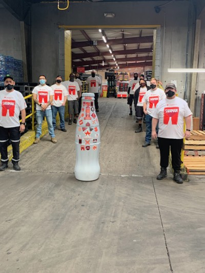 Sherman heroes welcome the Recognition Roadtrip Bottle to the Sherman facility on Jan. 31, 2022.