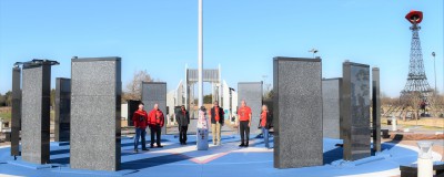Paris heroes and the Recognition Roadtrip Bottle visit the Ring of Honor in the center of the Red River Valley Veteran’s Memorial on Feb. 15, 2022. The Ring of Honor is the Memorial’s centerpiece, honoring all U.S. service members from the five counties around Paris (Lamar, Delta, Fannin, Red River in Texas and Choctaw in Oklahoma) that were killed in action.