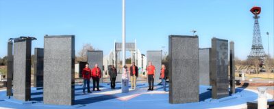 Paris heroes and the Recognition Roadtrip Bottle visit the Ring of Honor in the center of the Red River Valley Veteran’s Memorial on Feb. 15, 2022. The Ring of Honor is the Memorial’s centerpiece, honoring all U.S. service members from the five counties around Paris (Lamar, Delta, Fannin, Red River in Texas and Choctaw in Oklahoma) that were killed in action.