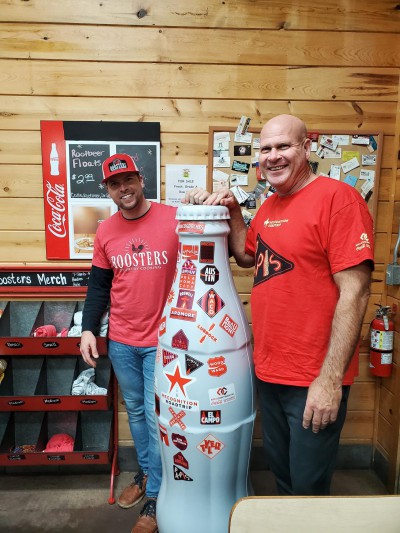 Paris heroes and the Recognition Roadtrip Bottle stop for a bite to eat at Roosters Café in neighboring town, Reno, TX. Fun fact: Roosters Café has its own family ties to CCSWB. The cafe is owned by Cayton Flippen (left), whose father, Michael Flippen (right), is the Regional Sales Manager at the CCSWB Paris Sales Center!