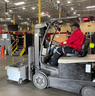 EFC hero Vincent Coleman, Yard Support, drives the Recognition Roadtrip Bottle across the facility for a quick check-up on Feb. 22, 2022. As the only center in the entire company for repairs and refurbishment, it’s important for the EFC to keep things running smoothly!