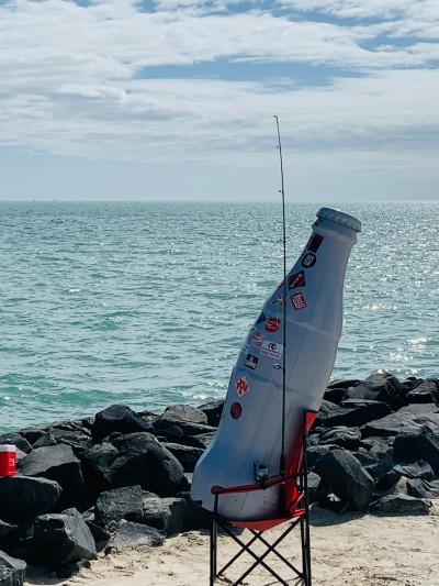 Gone fishin’! The Recognition Roadtrip Bottle takes an impromptu fishing trip at the beach on March 14, 2022.