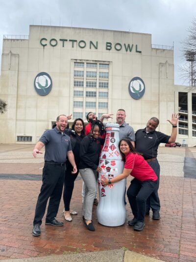 Mesquite heroes stop by the Cotton Bowl with the Recognition Roadtrip Bottle on Feb. 21, 2022. Opened in 1930, the Cotton Bowl Stadium serves as the site of the annual football game between the University of Texas and the University of Oklahoma – otherwise known as the “Red River Showdown.” Aside from football, the Stadium has also hosted numerous events in its 90-plus years, from World Cup games to concerts from entertainers like Elvis Presley, the Eagles and Aerosmith.