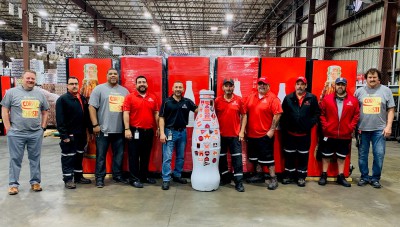 Corpus Christi heroes welcome the Recognition Roadtrip Bottle to their facility on March 14, 2022.