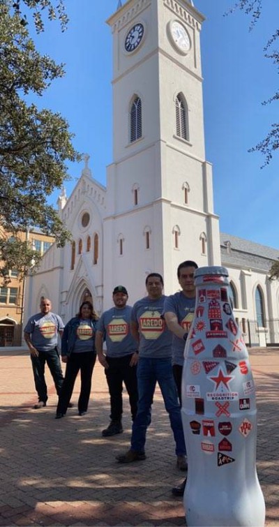 Laredo heroes with the Recognition Roadtrip Bottle at the San Agustin Cathedral on March 3, 2022. Located in downtown Laredo, San Agustin Cathedral traces its foundation to as early as 1755, the era of Laredo founder Don Tomas Sanchez and the group of Spanish Families that helped settle the city.