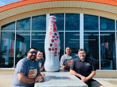 Corpus Christi heroes stop for a bite to eat with the Recognition Roadtrip Bottle on March 14, 2022 at the “Whataburger by the Bay,” the only two-story Whataburger in Texas. The 6,000-square-foot restaurant offers visitors a fantastic view on its open deck overlooking the ocean.