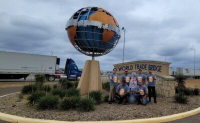 Laredo heroes and the Recognition Roadtrip Bottle visit the World Trade Bridge on March 3, 2022. This eight-lane, $128 million bridge was constructed in April 2020 to handle the rapid growth of commercial truck traffic between Mexico and the United States. Today, it is the No. 1 land border crossing in the U.S., with 4,000 to 6,000 commercial trucks crossing daily.