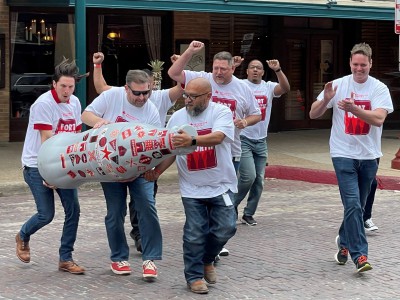 Fort Worth heroes arrive with the Recognition Roadtrip Bottle in the Fort Worth Stockyards on March 22, 2022. The Stockyards date back to the mid-1800s, when drovers trailed more than four million cattle through Fort Worth – which gave the city its nickname still used today: “Cowtown.”