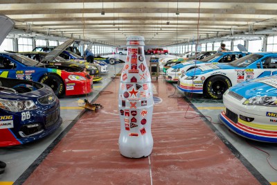 The Recognition Roadtrip Bottle speeds over to Texas Motor Speedway, a Texas-sized speedway just outside Fort Worth that hosts NASCAR and Indycar races, as well as hundreds of other races and events throughout the year. The Texas Motor Speedway, known as “The Great American Speedway,” is the fastest track on the NASCAR circuit with speeds nearing 200 miles per hour.