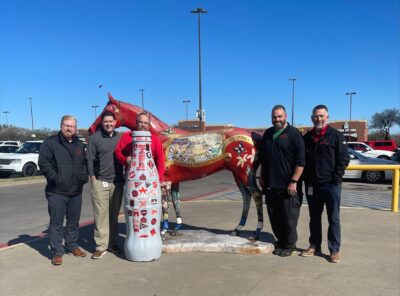 Wichita Falls heroes and the Recognition Roadtrip Bottle with the Spirit painted horse outside the United Market Street on March 28, 2022.