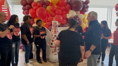 Dallas hero Veronica Epps, Business Manager, was selected to place the city sticker on the Recognition Roadtrip bottle on April 1, 2022.
