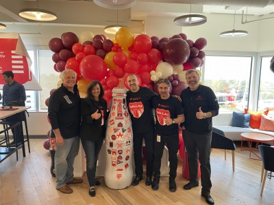 Dallas heroes with the Recognition Roadtrip Bottle and CCSWB president, Jean Claude Tissot on April 1, 2022.