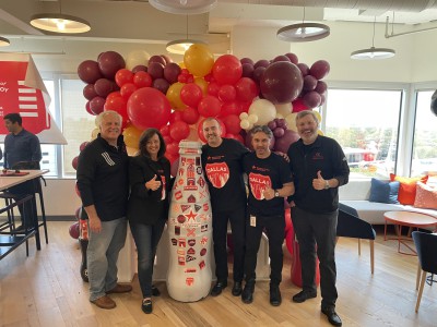 Dallas heroes with the Recognition Roadtrip Bottle and CCSWB president, Jean Claude Tissot on April 1, 2022.